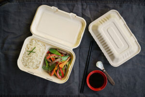 Beef stir-fry and rice in clamshell packaging
